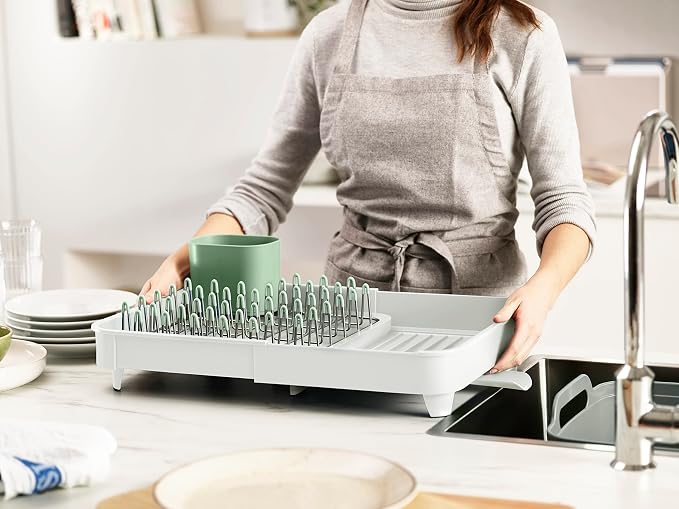 Joseph Joseph Extend Expandable Dish Drainer Rack with Removable Flatware Holder Swivel Draining Spout - Stone/Sage Green - Image 6
